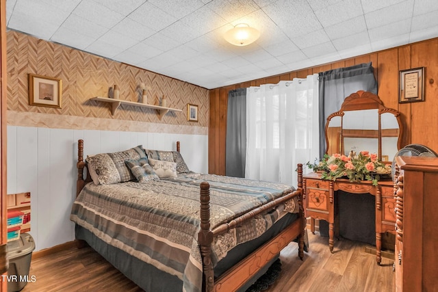 bedroom featuring hardwood / wood-style floors