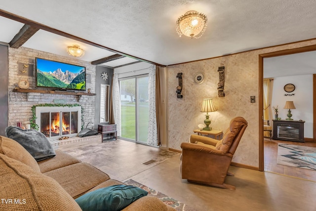 living room featuring a brick fireplace and a textured ceiling