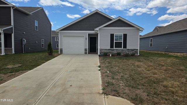 craftsman-style home featuring a garage and a front lawn