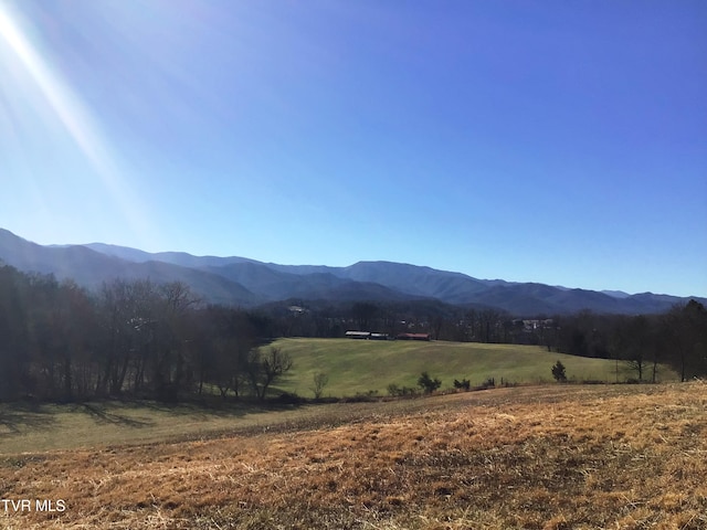 mountain view with a rural view