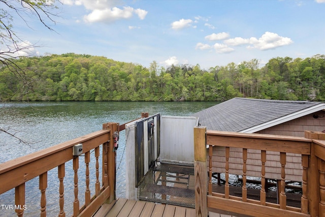 view of dock with a water view