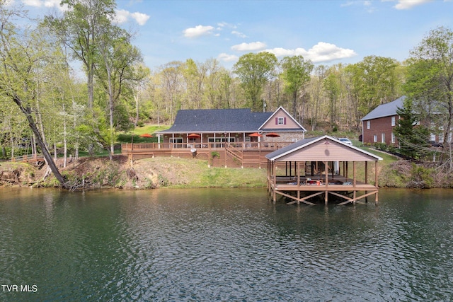 view of dock featuring a deck with water view