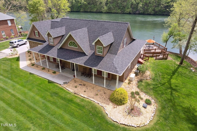 drone / aerial view featuring a water view