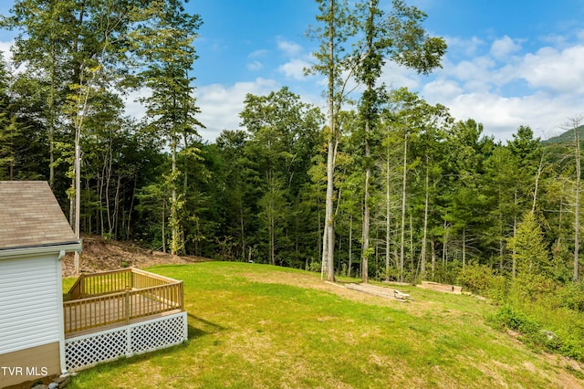 view of yard featuring a deck