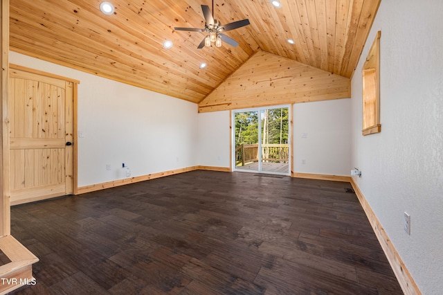 spare room featuring wood ceiling, dark wood-type flooring, ceiling fan, and vaulted ceiling