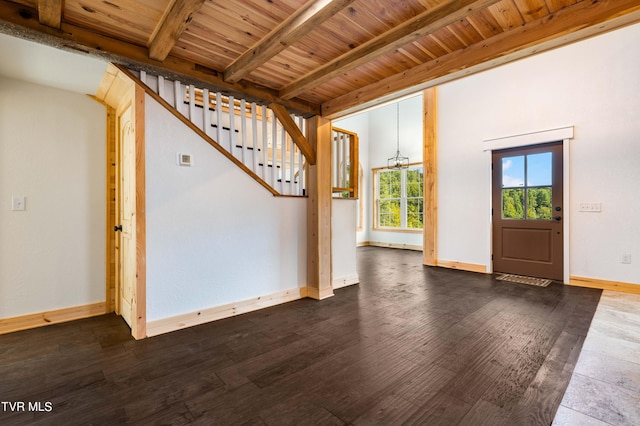 foyer entrance with beamed ceiling, wooden ceiling, and hardwood / wood-style flooring