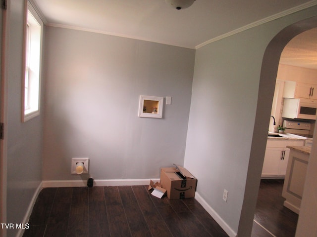 laundry area with cabinets, hookup for a washing machine, dark hardwood / wood-style floors, and sink