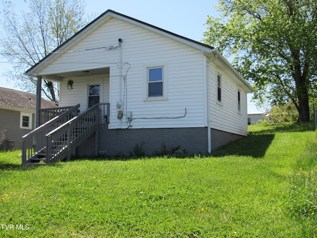 bungalow with a front yard