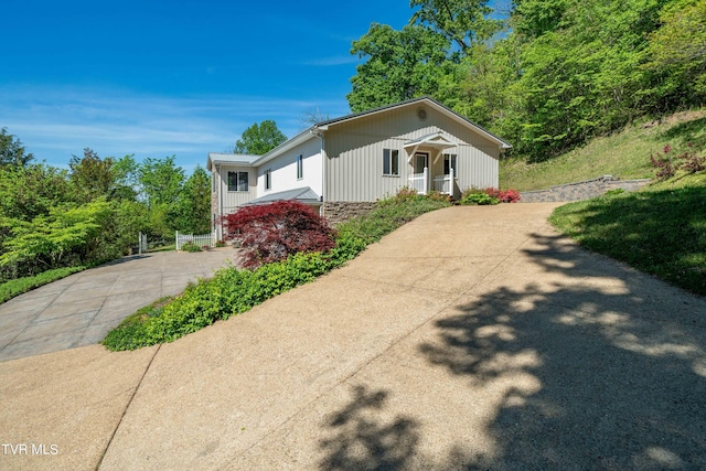 bungalow-style home featuring driveway