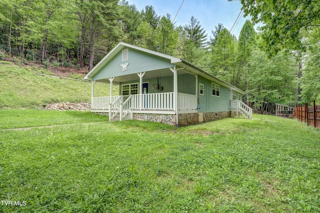 view of front of home with a front yard