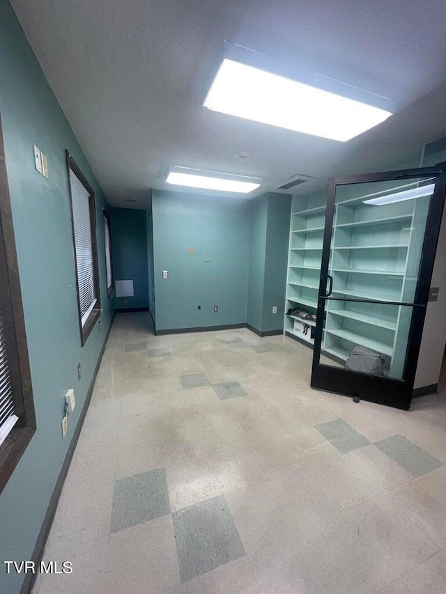 basement with light tile flooring