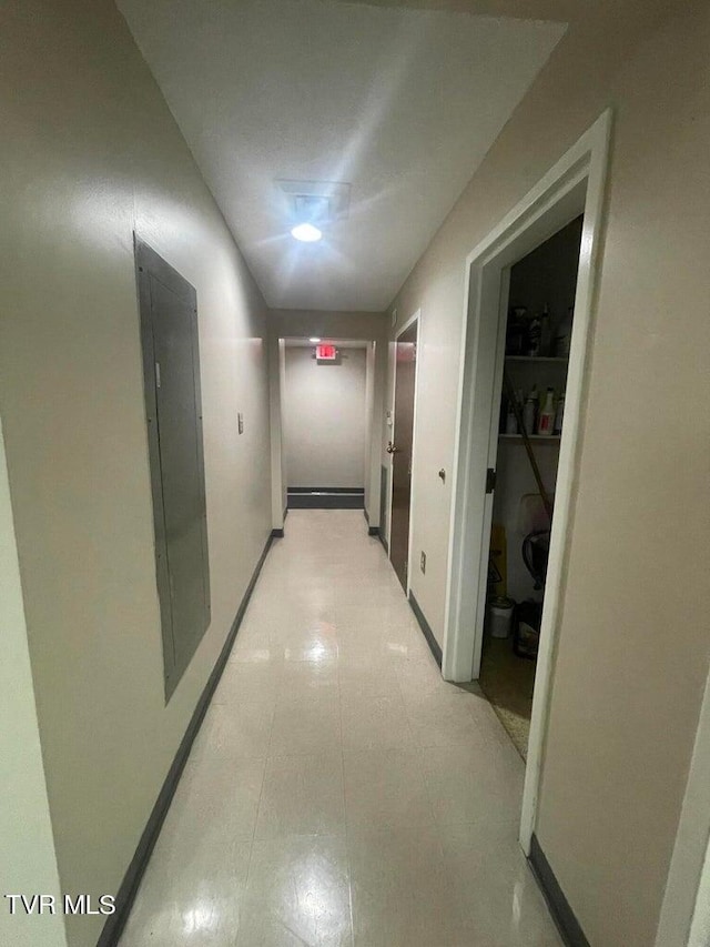 corridor featuring light tile flooring