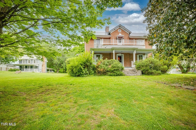 view of front of property with a front lawn