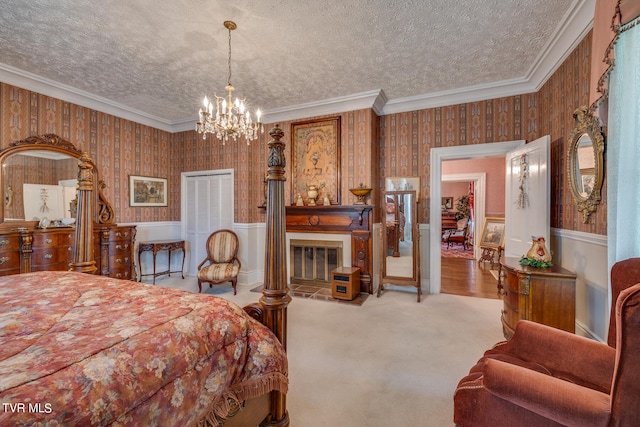 bedroom featuring a textured ceiling, an inviting chandelier, wooden walls, and ornamental molding