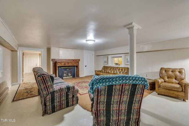 living room featuring ornate columns and a high end fireplace