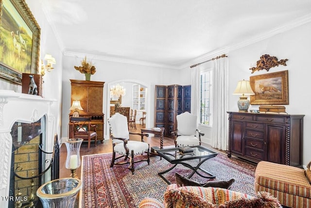 living room with hardwood / wood-style flooring and ornamental molding