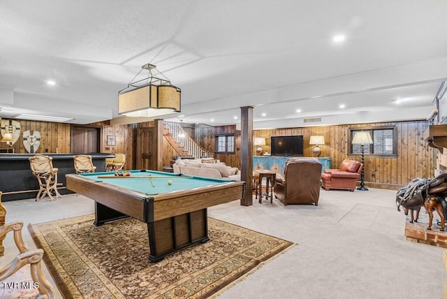 recreation room with wooden walls, light carpet, billiards, and decorative columns