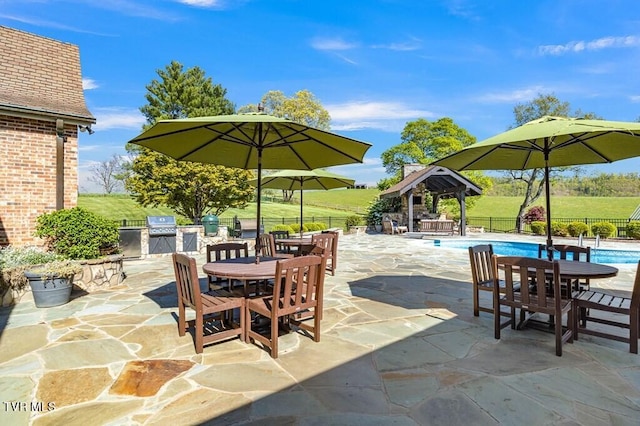 view of patio featuring a gazebo