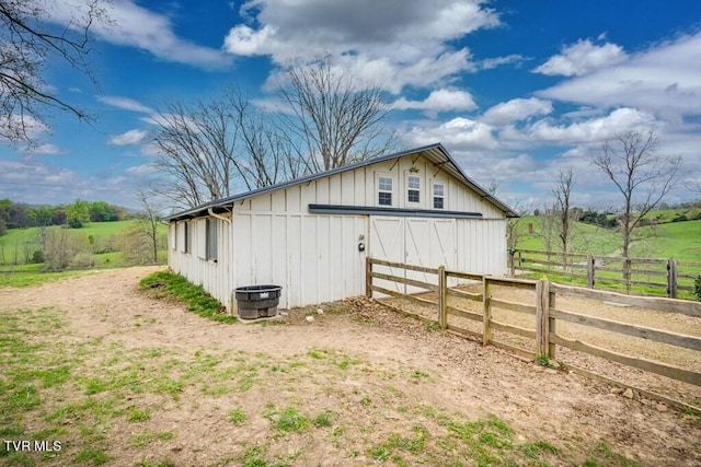 view of outdoor structure featuring a rural view