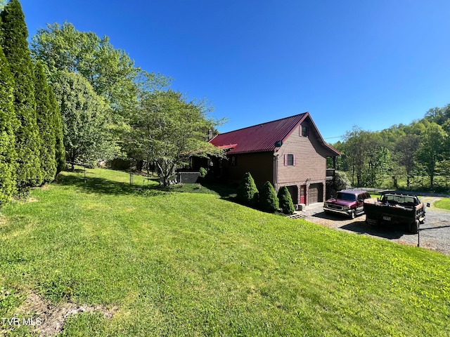 view of yard featuring a garage