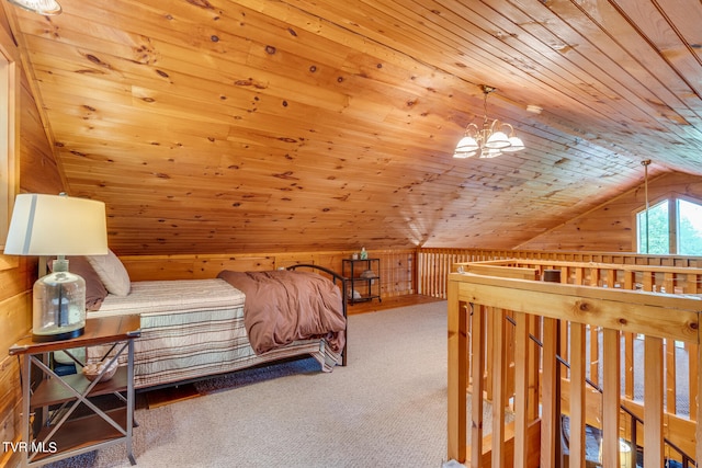 carpeted bedroom with wooden ceiling, a chandelier, and vaulted ceiling