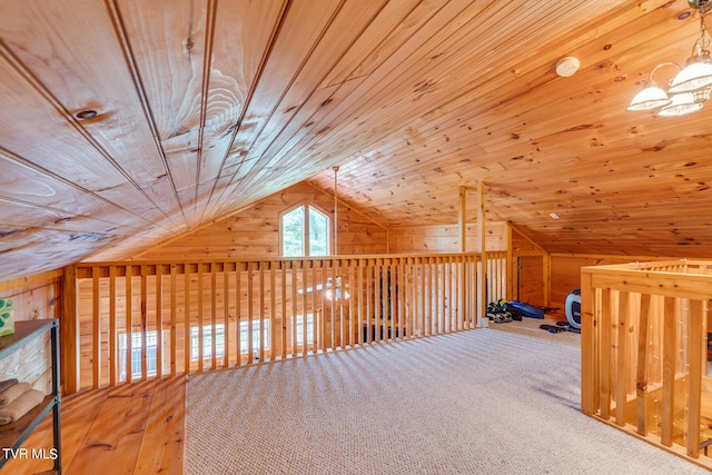 bonus room featuring vaulted ceiling, carpet floors, and wood ceiling