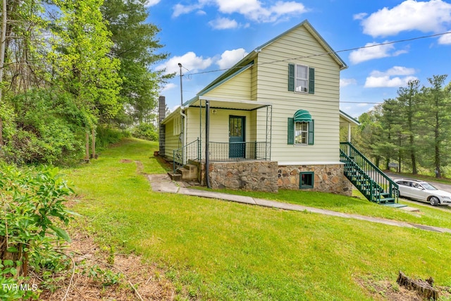 view of property featuring a front yard