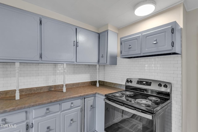 kitchen featuring tasteful backsplash and stainless steel electric stove