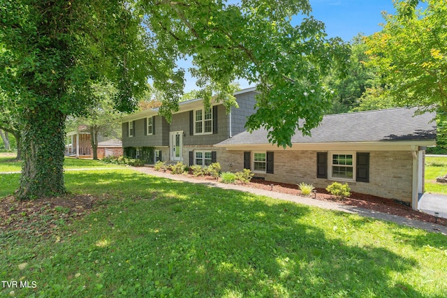 view of front of home with a front lawn