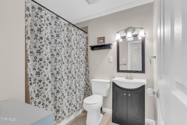 bathroom with crown molding, tile flooring, vanity, and toilet