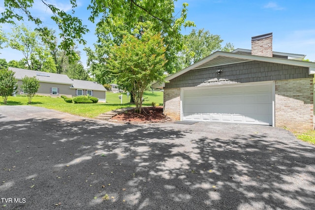 view of side of home featuring a yard