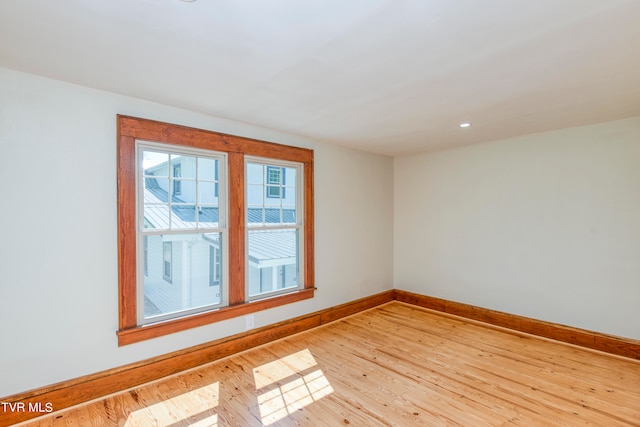 empty room featuring hardwood / wood-style flooring