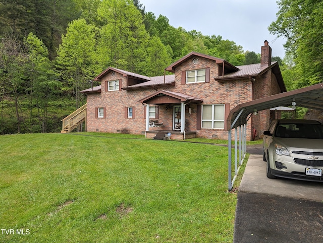 view of front of house featuring a carport and a front yard