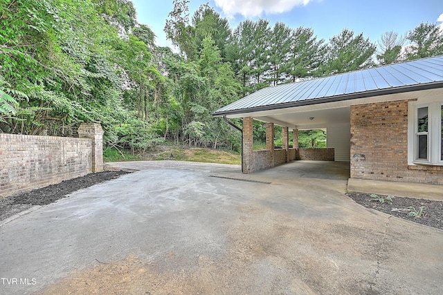 view of patio / terrace featuring a carport