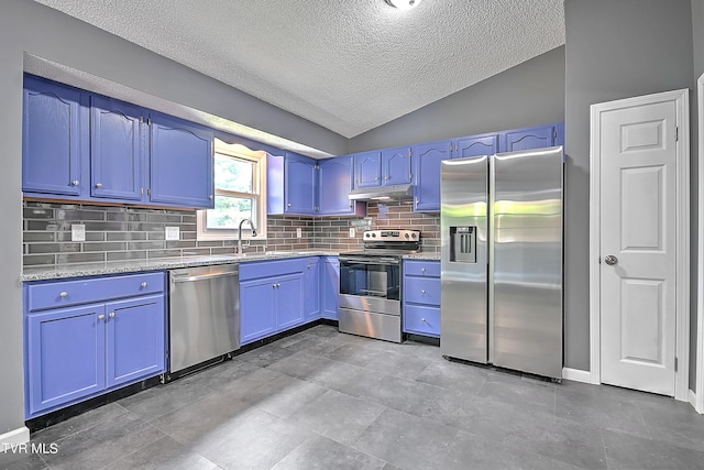 kitchen featuring decorative backsplash, lofted ceiling, blue cabinets, and appliances with stainless steel finishes