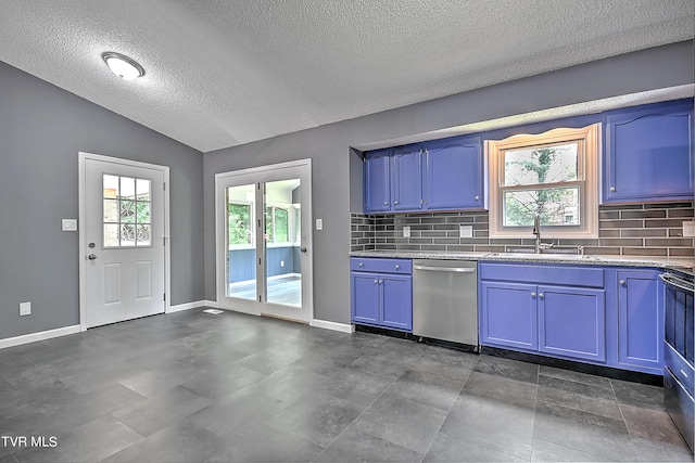 kitchen with blue cabinetry, decorative backsplash, sink, and stainless steel dishwasher