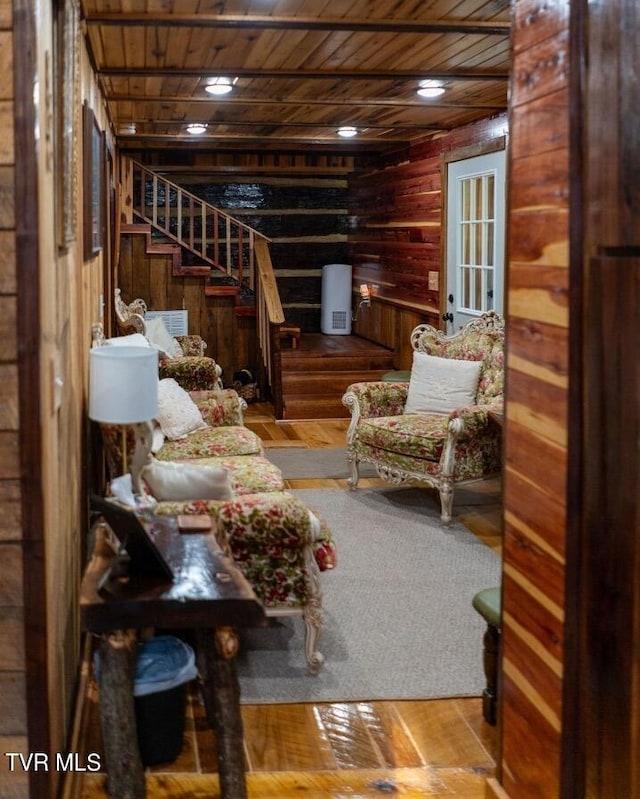 living room featuring wooden ceiling and hardwood / wood-style floors