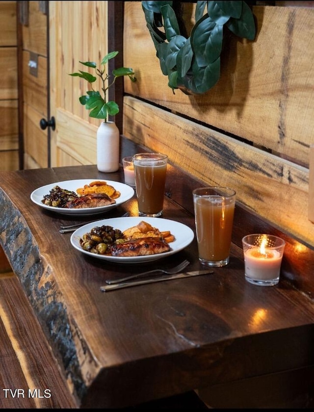 details with wooden walls and a fire pit