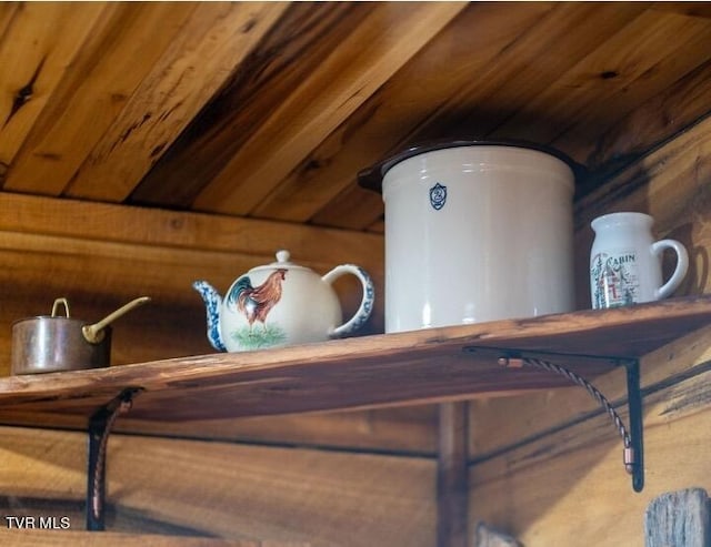 details with wood walls and wooden ceiling