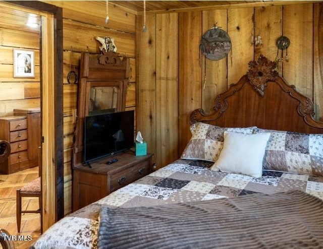 bedroom with wooden walls