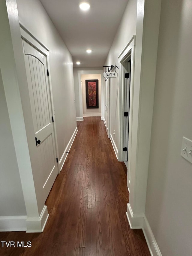 hall featuring dark hardwood / wood-style flooring