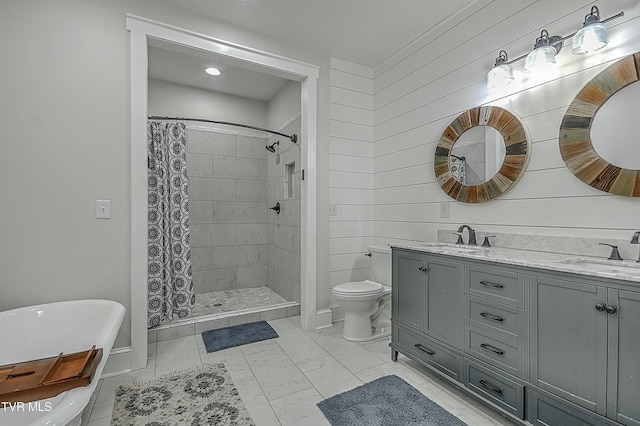 bathroom with vanity, toilet, curtained shower, and wooden walls