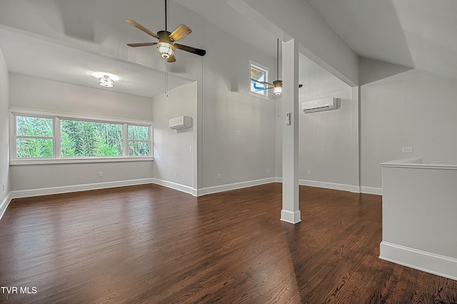 unfurnished living room featuring ceiling fan, dark wood-type flooring, and a wall unit AC