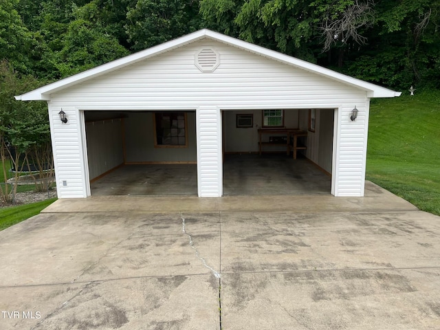 garage with a lawn