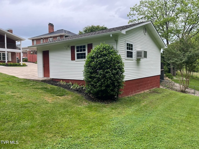 view of home's exterior featuring a yard