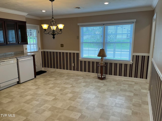 interior space with hanging light fixtures, light tile flooring, dishwasher, and a wealth of natural light