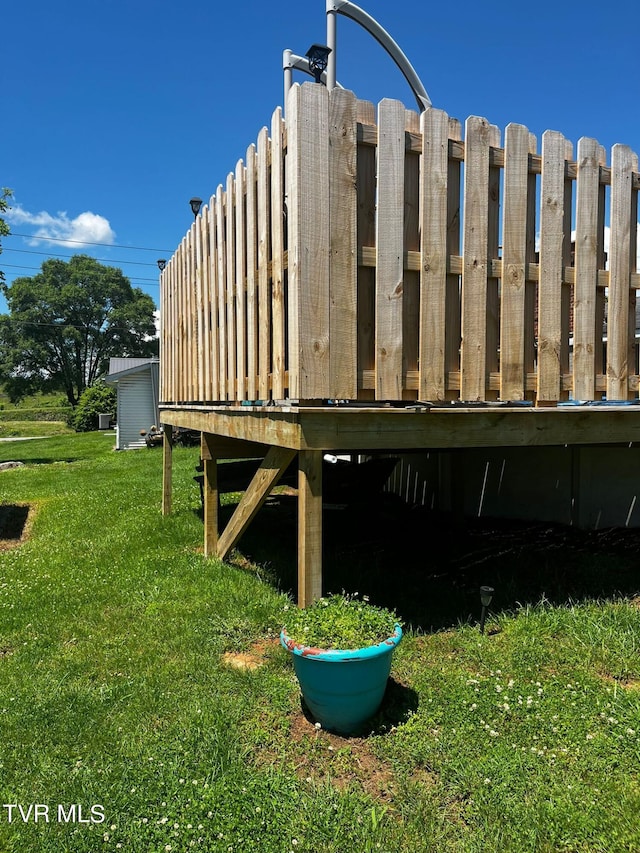 view of yard with a deck