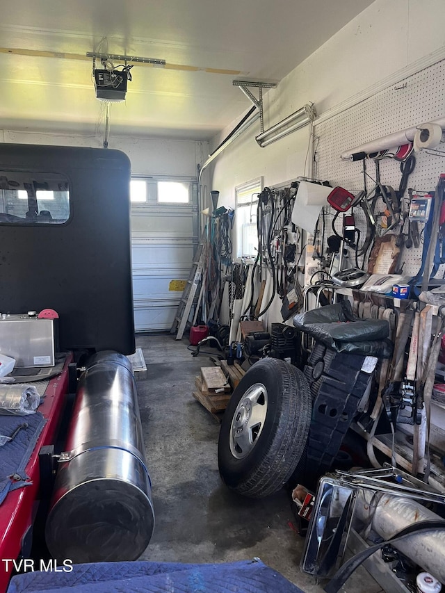 garage featuring a garage door opener