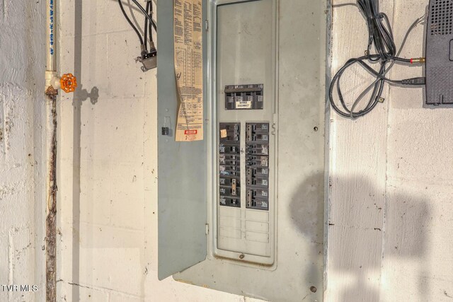 utility room featuring electric panel