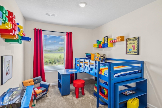 115 Raceday Center Dr Unit E-3, Bristol, TN 37620 - bedroom featuring carpet floors, baseboards, a textured ceiling, and visible vents